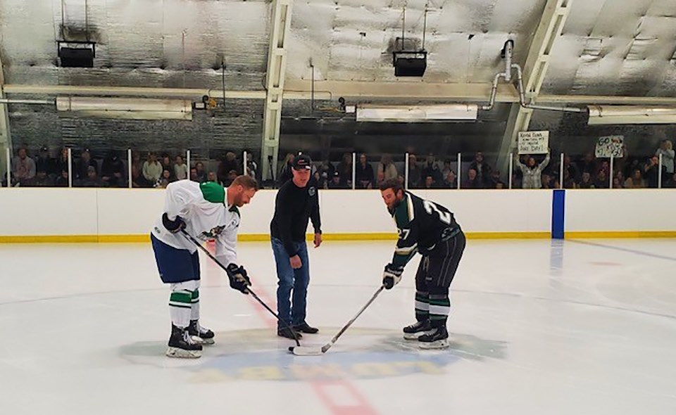 HOCKEY HAPPENING: On October 7, Powell River Regals’ forward Austin McLaren [right] participated in the ceremonial opening faceoff before the first senior hockey game in Lumby since the 1980s.