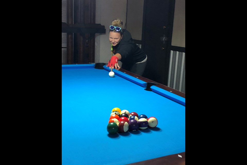 Powell River 8-ball League member Tanya Charuk gets ready to break during a recent night of play.