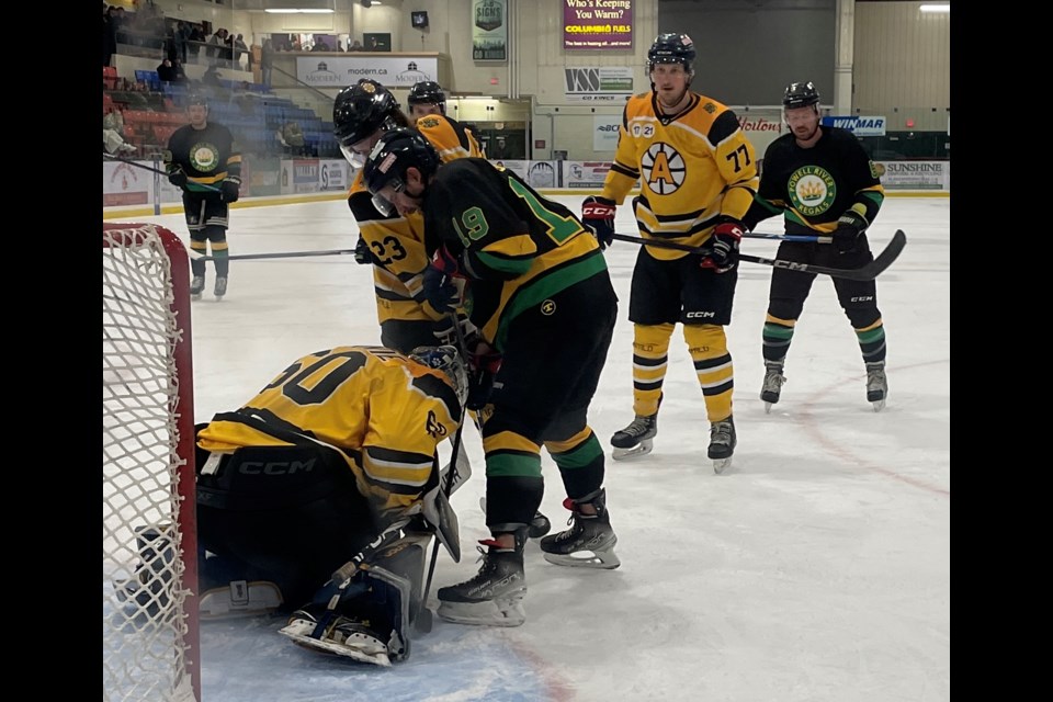 Powell River Regals forward Chad Niddery hovers over the Lake Cowichan Appollos goaltender hoping for a loose puck during a senior AA men’s hockey game at Hap Parker Arena on November 15.