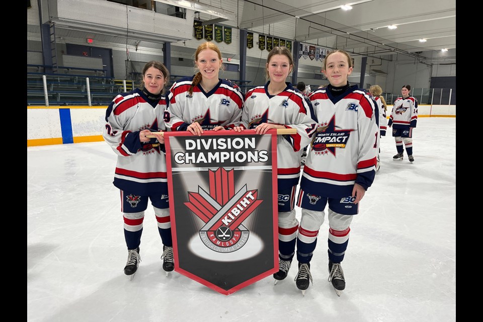 GOLDEN GIRLS: Teammates [from left] Bree Behan, Marin Carlos, Harper Berukoff and Claire Karger helped North Island U15 Impact reach the top of the podium at a recent tournament in Kamloops.