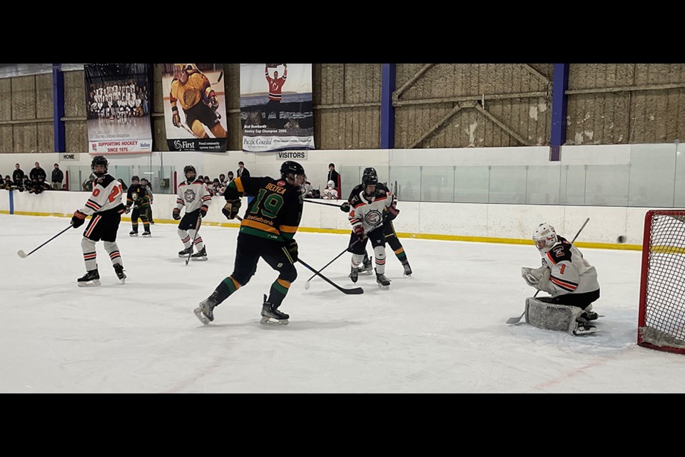 Powell River U18 Kings forward Ben Belyea watches the puck sail past the Campbell River Tyees' goaltender, but not into the net, during a minor hockey game at Powell River Recreation Complex on January 19.