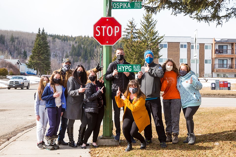 Prince George residents gather around councillor Kyle Sampson for the unveiling of HYPG Blvd. | James Doyle Photography