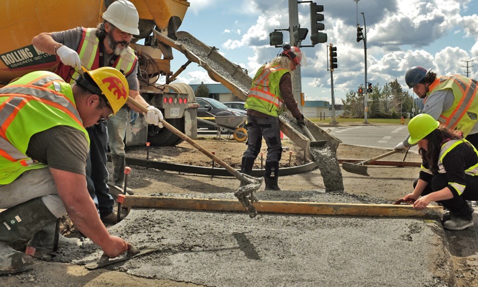 PG Road crews paving