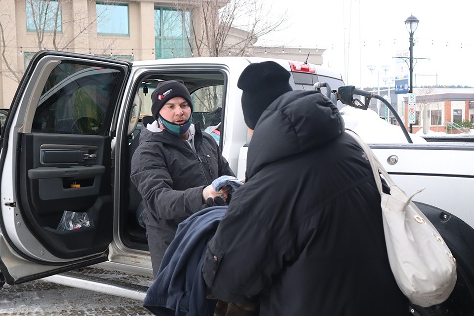 Cody Cutler rallied his coworkers to help those in need in downtown Prince Goerge. (via Hanna Petersen)