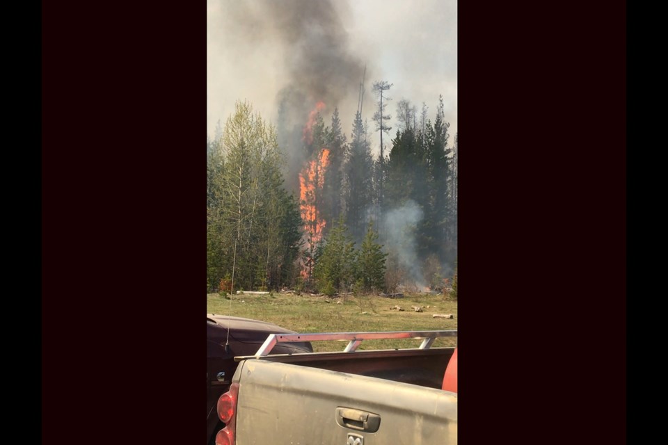 Flames from the Opatcho Lake wildfire southeast of Prince George (via Facebook/Mike Milum)