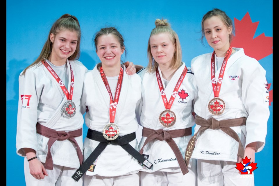 Hart Judo Academy's Kimiko Kamstra (2nd right) wins a bronze medal at the 2019 Canadian Open Nationals in Edmonton (via Judo Canada)