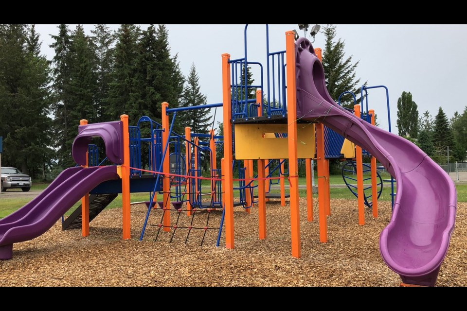 The playground at Ecole Franco-Nord is missing its climbing wall to the left of the purple slide (via Kyle Balzer)