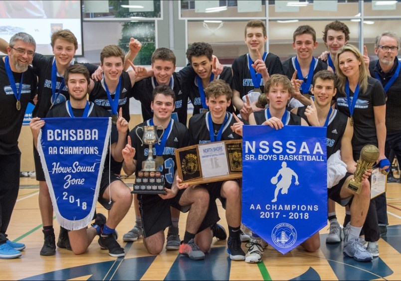 Dylon Matthews (back row, third right) poses with the Seycove Seyhawks after winning the bronze medal at 2018 B.C. Senior Boys Basketball Championships (via Glacier Media)