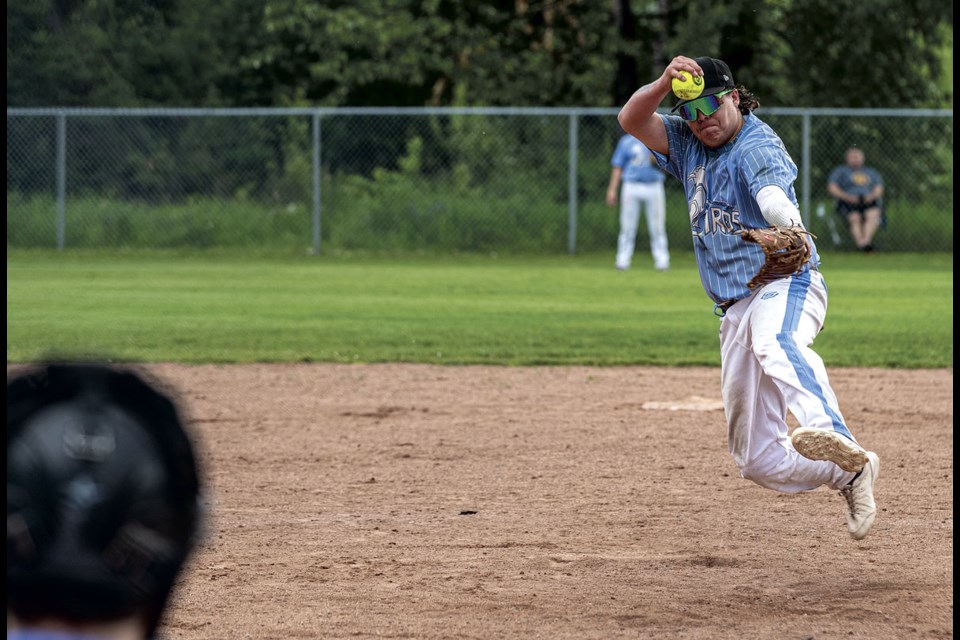 Nak'azdli Hummingbirds pitcher #22  Brydon Lessard goes through his windup and delivery during their battle against Big Guy Lake Saturday.