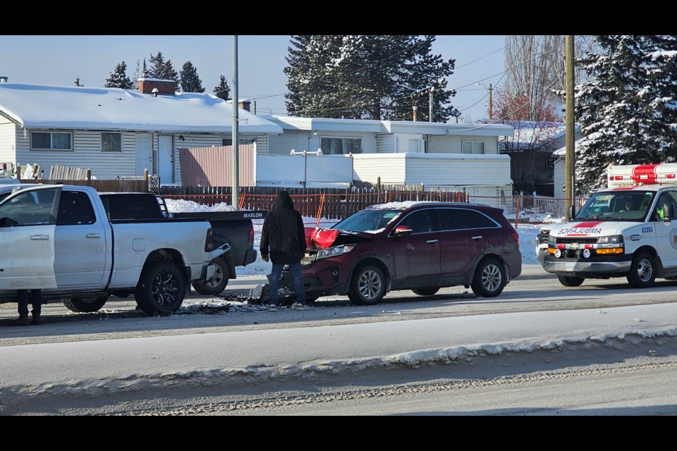 First responders work at the scene of a collision at Highway 97 and 5th Avenue in Prince George, BC on Monday, Feb. 3, 2025.