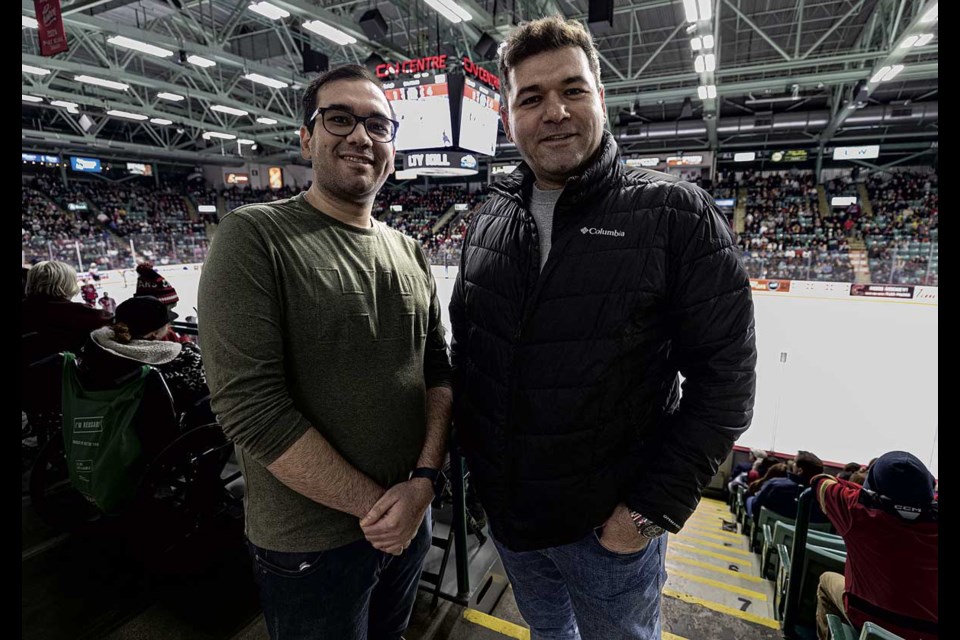 Brothers Hossein and Mahdi Asadi became instant Cougars fans as they watched their first ever live hockey game and the local squad  devastated the Vancouver Giants 7-1 Saturday Nov. 9 at CN Centre.