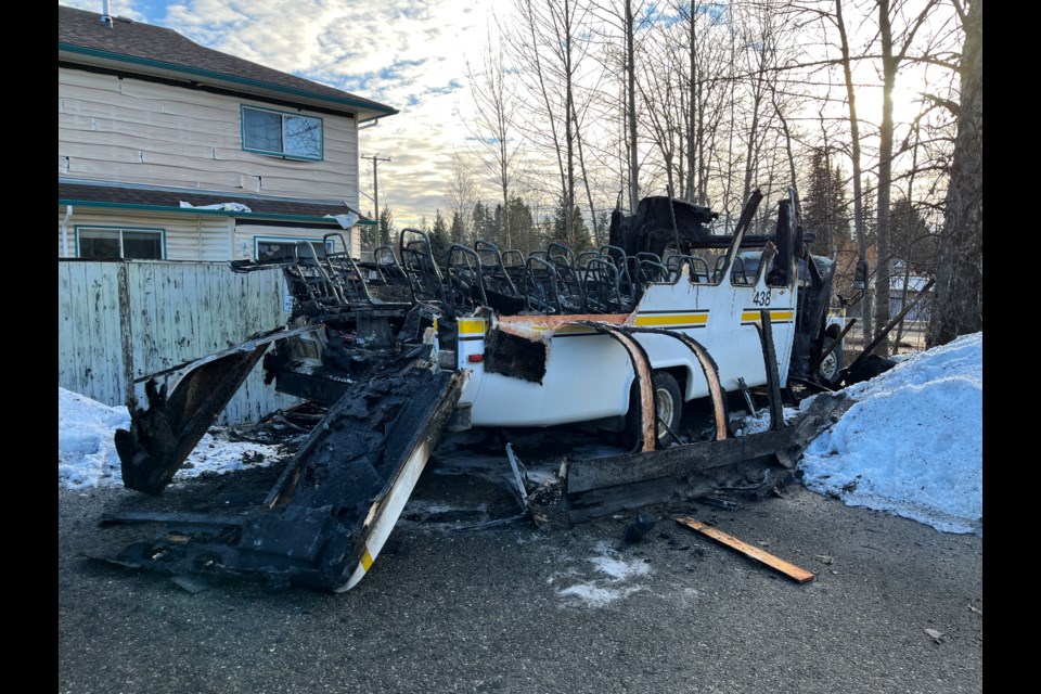 The burnt remains of a bus sit in the parking lot of the Columbus Community Centre at 7201 Domano Blvd. in Prince George on the morning of Monday, March 3, 2025.