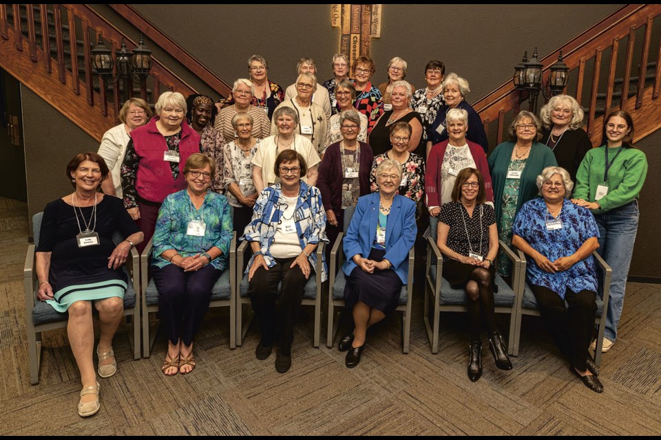 Members of CFUW Prince George chapter pose for a picture in the lobby of First Baptist Church  Wednesday during their 60th Anniversary celebration.