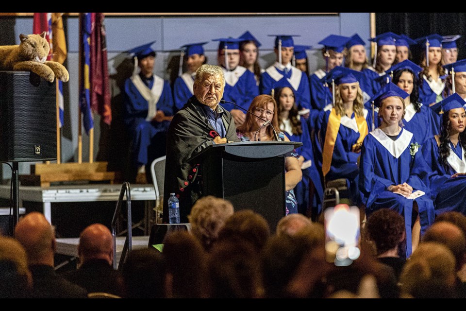 Lheidli T'enneh elder Victor Joseph delivers the traditional welcome and blessing to the 177 graduates and families of College Heights Secondary School's class of 2024 at the graduation ceremony at the Prince George Conference and Civic Centre Thursday, May 30, 2024.