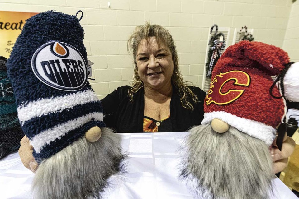 Kim Bittner of Kimberly's Kreations is ready for the Battle of Alberta with gnomes to represent any NHL team you need at her table as well as custom ornaments and decorations in the CKS Creations Craft Fair at 777 Kinsmen Place.