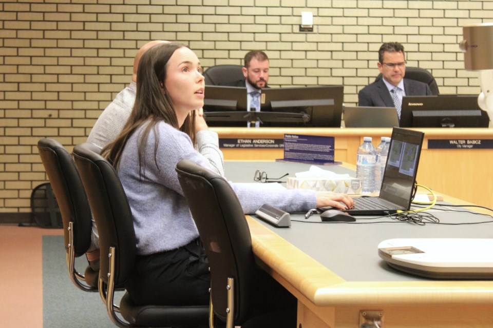 Megan Hickey of L&M Engineering gives a presentation on a proposed development at 880 Guay Road at the Monday, Feb. 24, 2025 Prince George city council meeting.