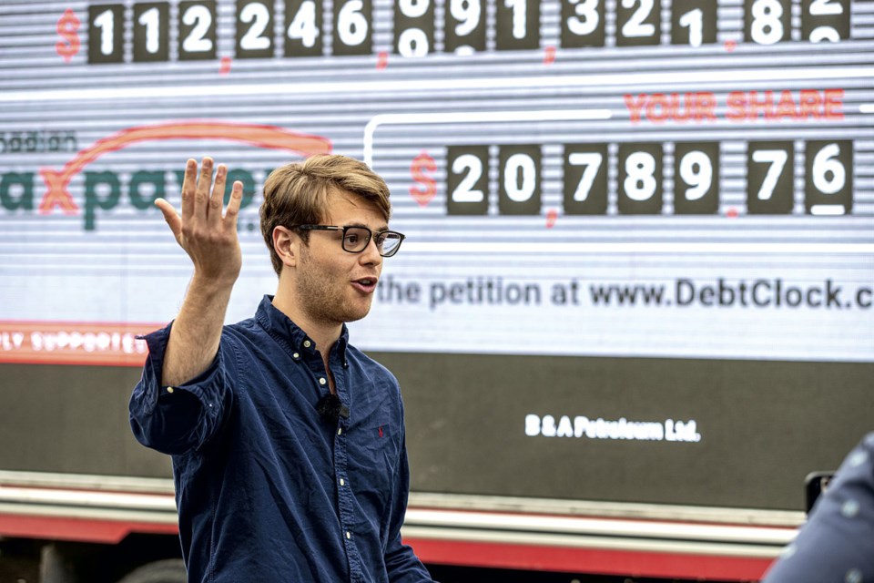 Canadian Taxpayers Federation B.C. director Carson Binda discusses the provincial debt, displayed on the Debt Clock truck, and how it impacts every B.C. resident at a press conference held at the Exploration Place on Friday.
