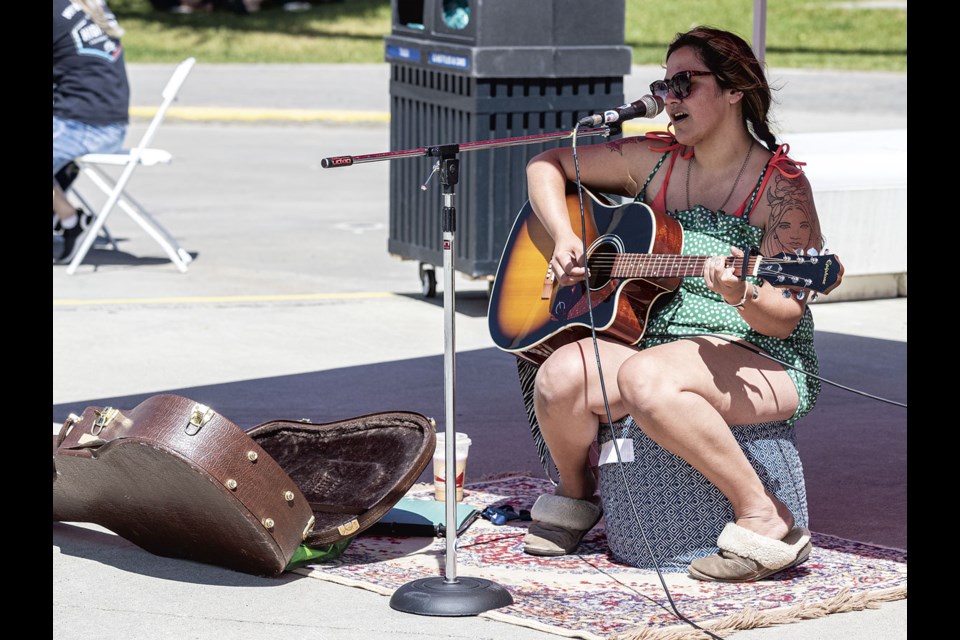 Amanda Wood adds to the ambience of the first Foodie Friday of the summer with her vocals and guitar at Canada Games Plaza on Friday, July 5, 2024 in Prince George, B.C.