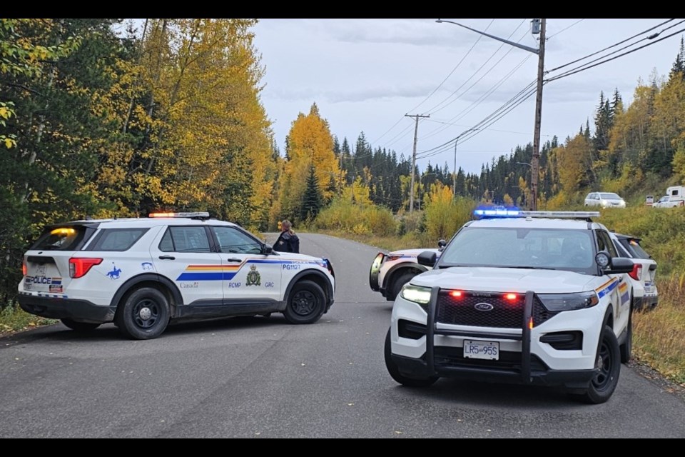 Prince George RCMP officers block Hoferkamp Road on Monday, Oct. 7, 2024.