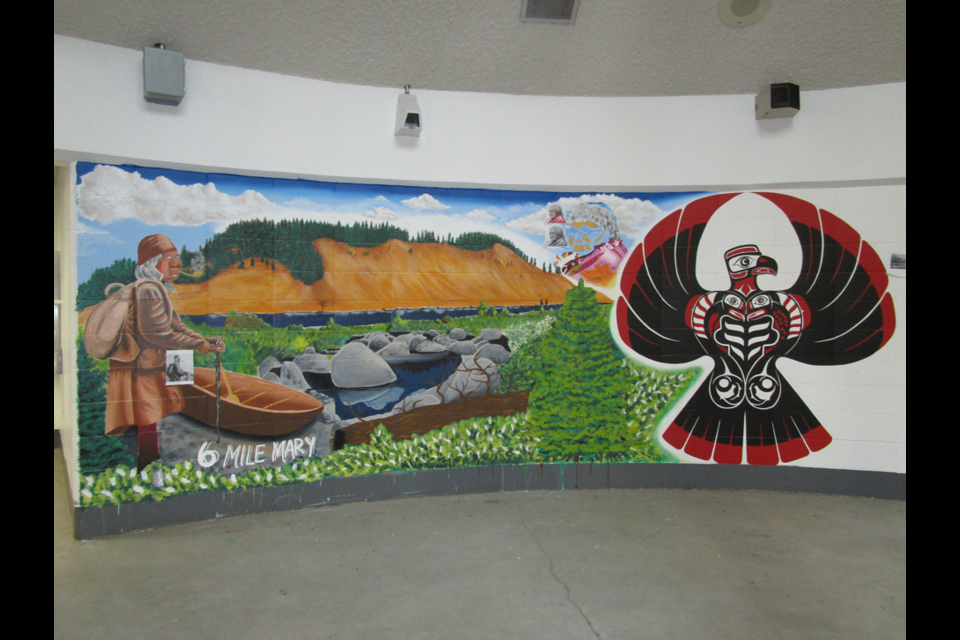 This is a part of a mural created on the walls of PGRCC by Dylon McLemore, a person in custody, as a way toward healing. This mural honours the iconic cutbanks, a part of the Lheidli T'enneh First Nation territory.