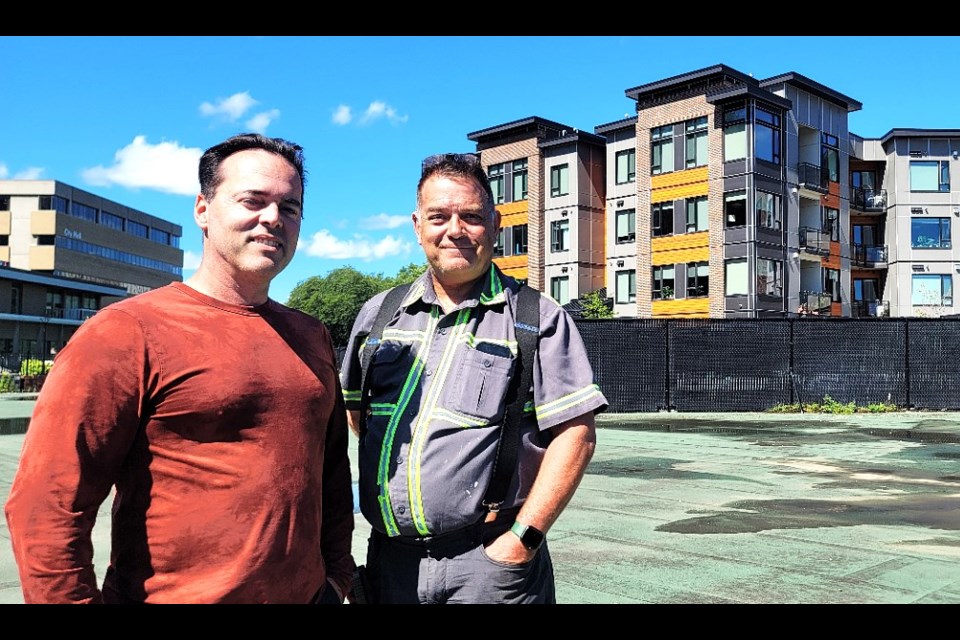 Ador Properties president Peter Wise, left, and site supervison Peter Johnson check out the site of Phase 2 and 3 and the Park House apartment complex now under construction in downtown Prince George.