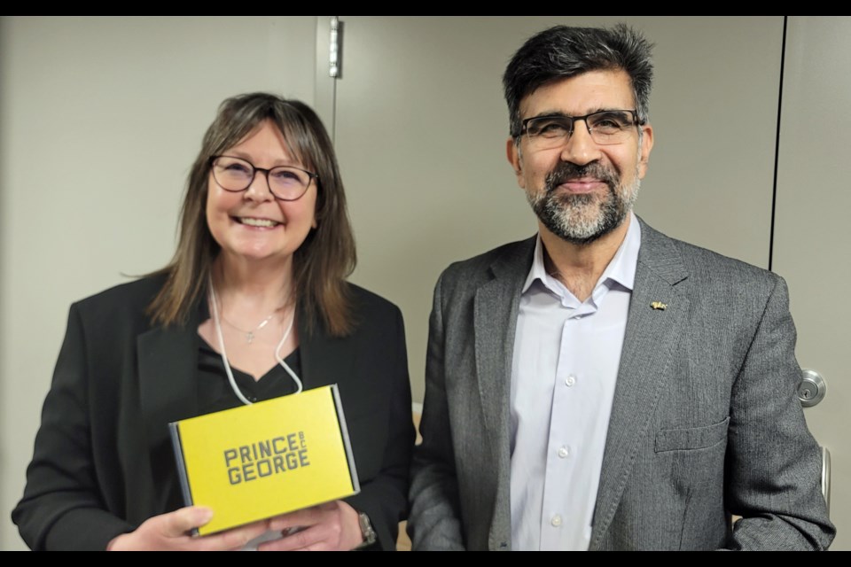 Future Fuels Forum panelists Tessa Gill, left, and Hossein Kazerian discussed opportunities for research and development between Arbios Biotech and UNBC.