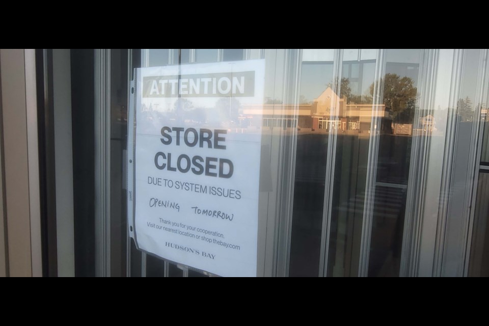 This sign indicating the Hudson's Bay department store in Prince George is closed due to system issues has been posted for at least the past three days.