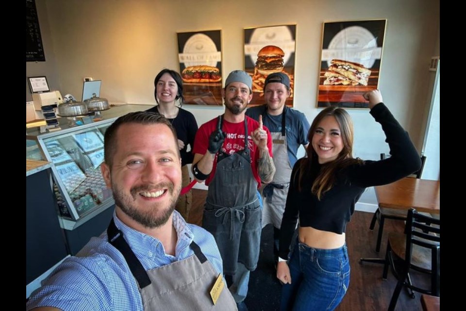 Wall of Fame Sandwich Shop staff. Owner operator Jordan Reinitz is on the left.