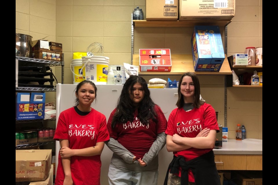 Grade 9 students Renee White, Evie Erickson-Murdock, and Dexter Gagnon ran Eve's Bakery for one week at D.P. Todd Secondary School. 