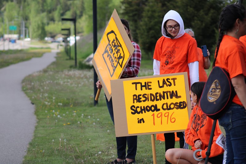 A gathering was held near SD57 offices on Highway 16 to commemorate the one year anniversary of the Kamloops Residential School graves discovery. 