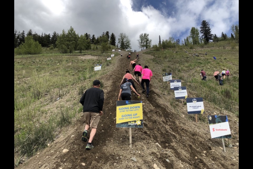 The seventh annual Climb for Cancer saw the community trek up the cutbanks to raise money for the Kordyban Lodge. 