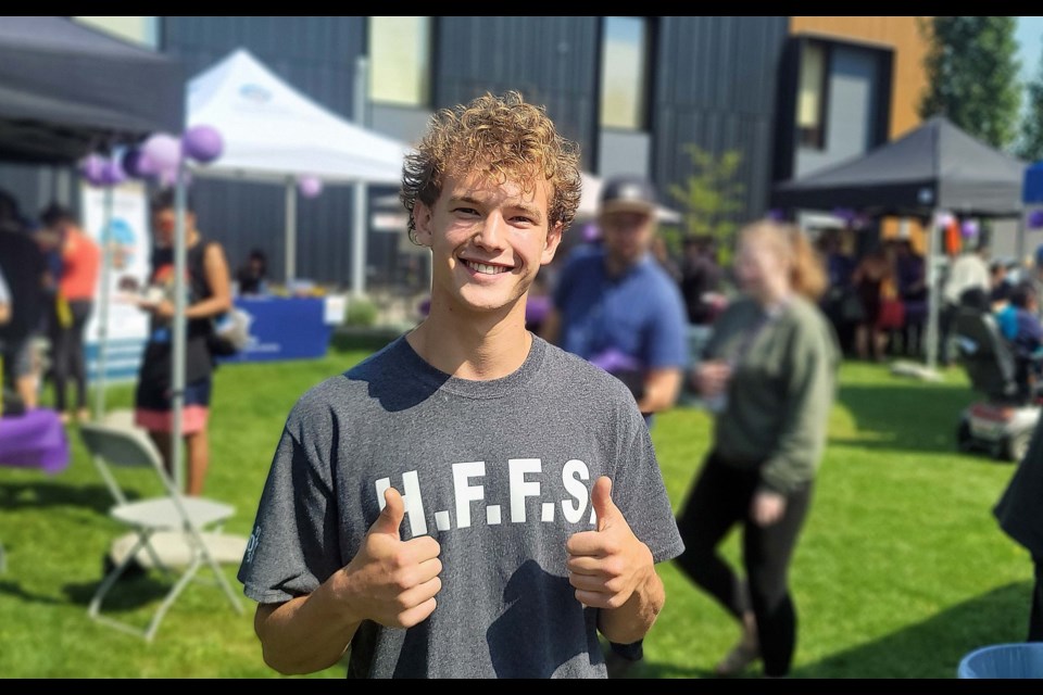 Brody Beetlestone gives his thumbs-up approval to Wednesday's Healing Fire event at Wood Innovation Square.