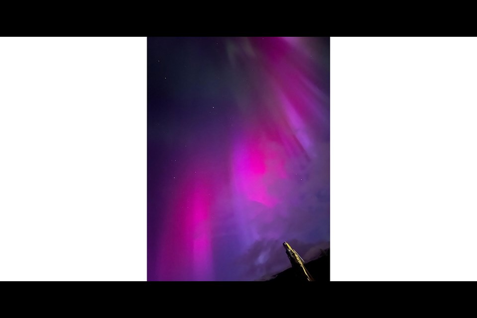 Here are the Northern Lights in a haze of pink just north of Bear Lake on March 23 2023.