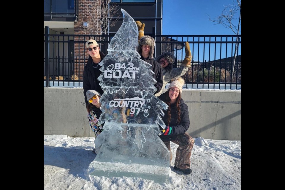 The Patterson family attends Winterfest presented by Downtown Prince George every year. From bottom left is Jaden, above her is friend of the family Peter Nyce, the tilted guy, back right, is Dad Tim with Carsen and Erin, who is kneeling.