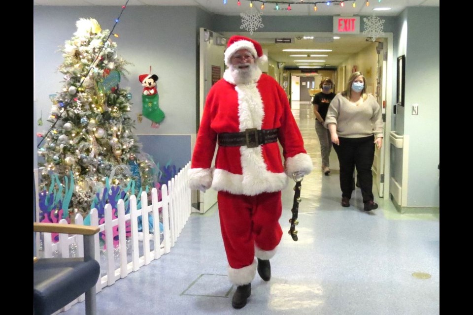 Santa made his way through the halls at the pediatric unit at UHNBC Wednesday morning to visit some children.