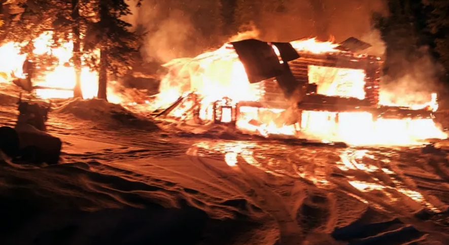 Former Prince George resident Guy Martial snapped this photo of his house in Cassiar being destroyed by fire on Nov. 16.