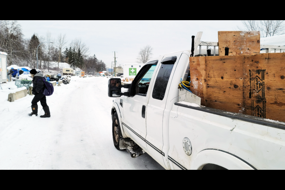 James and his truck are a welcome site to residents of the Moccasin Flats encampment in downtown Prince George because they're his friends and he helps them.