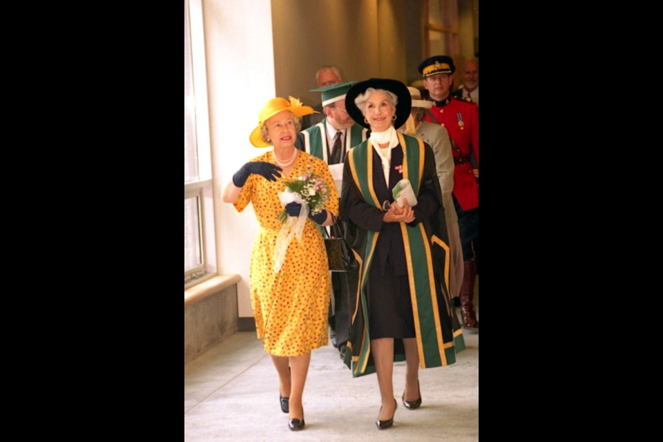 Queen Elizabeth II with University of Northern British Columbia chancellor Iona Campagnolo in 1994.