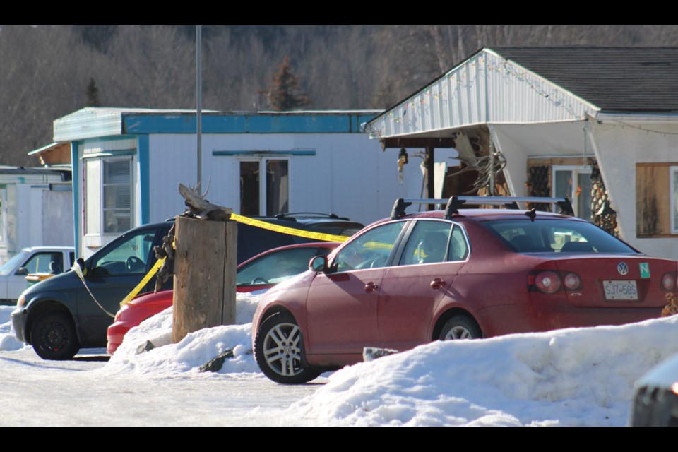 A home in the Sunrise Valley Mobile Home Park was behind police tape on Tuesday as Prince George RCMP investigate a homicide.