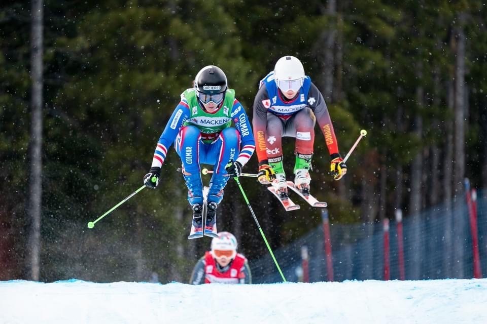 Tiana Gairns of Prince George, right, gets some air time as she competes in a World Cup race Jan. 15 at Nakiska, Alta. She finished seventh.