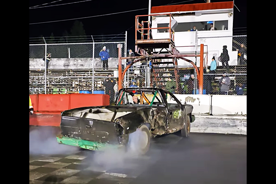 Jeff Murray and his 94X pickup puts on a smoke show after claiming last car running honours at the Prince George Auto Racing Association's Halloween Havoc hit-to-pass event Saturday night at PGARA Speedway.