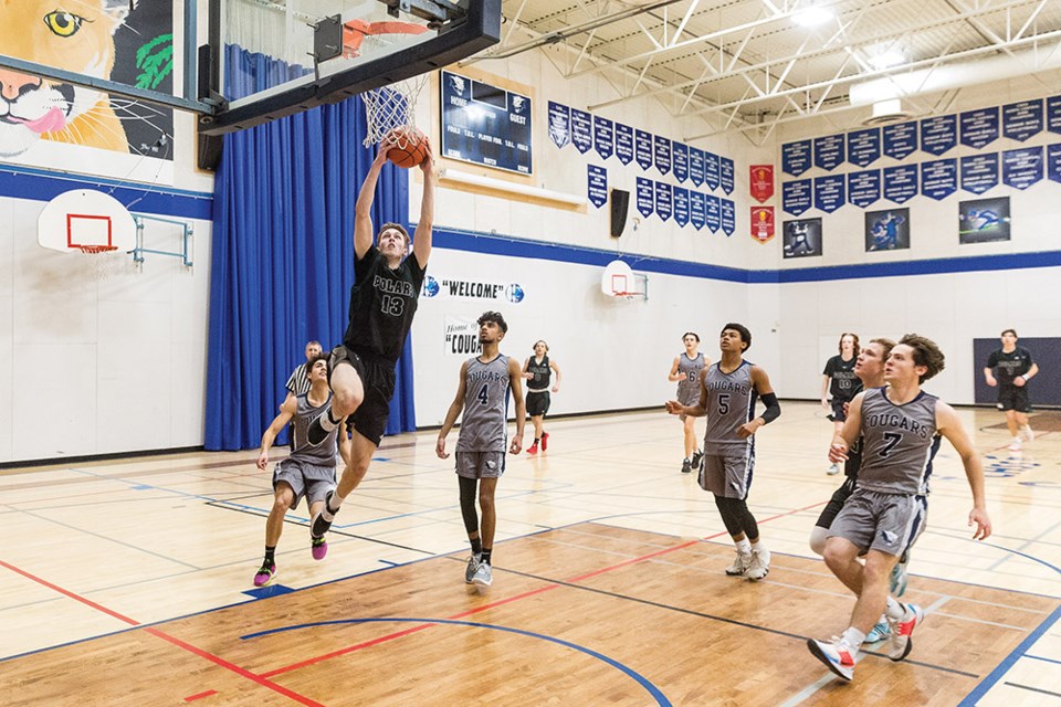 Citizen Photo by James Doyle. The College Heights Cougars took on the PGSS Polars on Saturday afternoon at College Heights Secondary School gymnasium in the CHSS Ice Breaker Co-Ed Senior basketball tournament. The Polars went on to win by a score of 97-78.