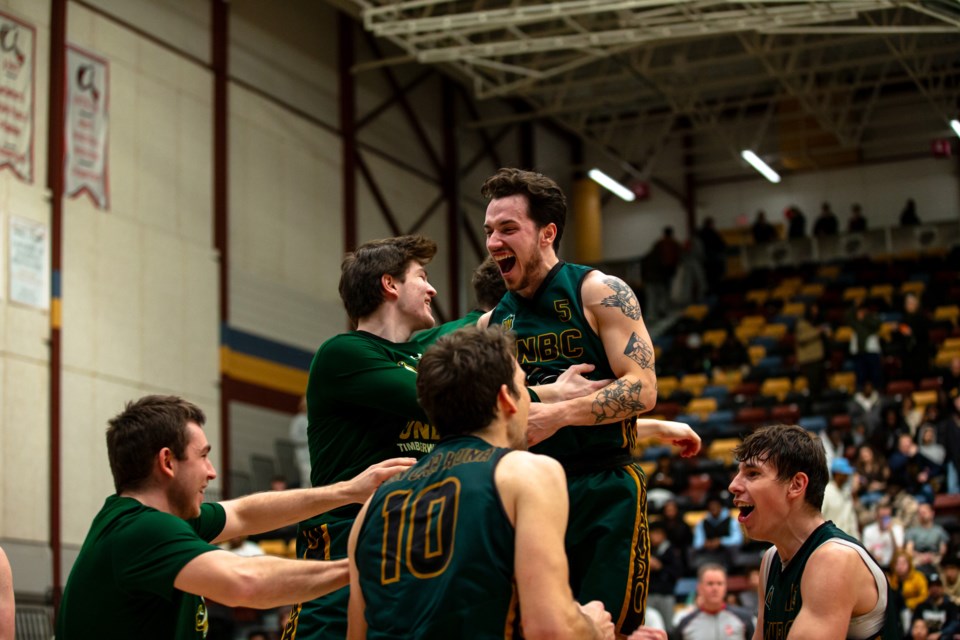 The faces tell the tale. The UNBC Timberwolves celebrate their historic quarterfinal win over the Manitoba Bisons that puts UNBC into the Canada West semifinals for the first time. They'll face Victoria Saturday afternoon in Winnipeg.