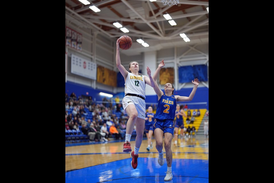 UNBC guard Victoriia Filatova goes in for a layup Saturday against the Victoria Vikes. 