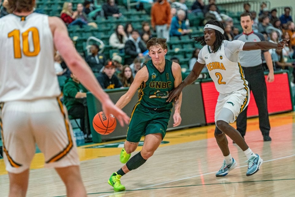 UNBC guard Marcus Wilson drives closer to the net during Saturday's game in Regina against the University of Regina Cougars