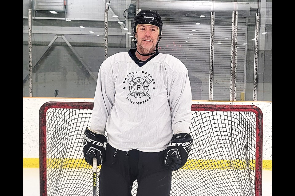 Jim Gunn gets ready for a game with the Prince George firefighters Tuesday, Feb. 11 at Kin 2 arena. Gunn, 58, played defence for the Centennial Cup-champion Richmond Sockeyes in 1987. That team will be inducted into the BC Hockey Hall of Fame in Penticton in July.