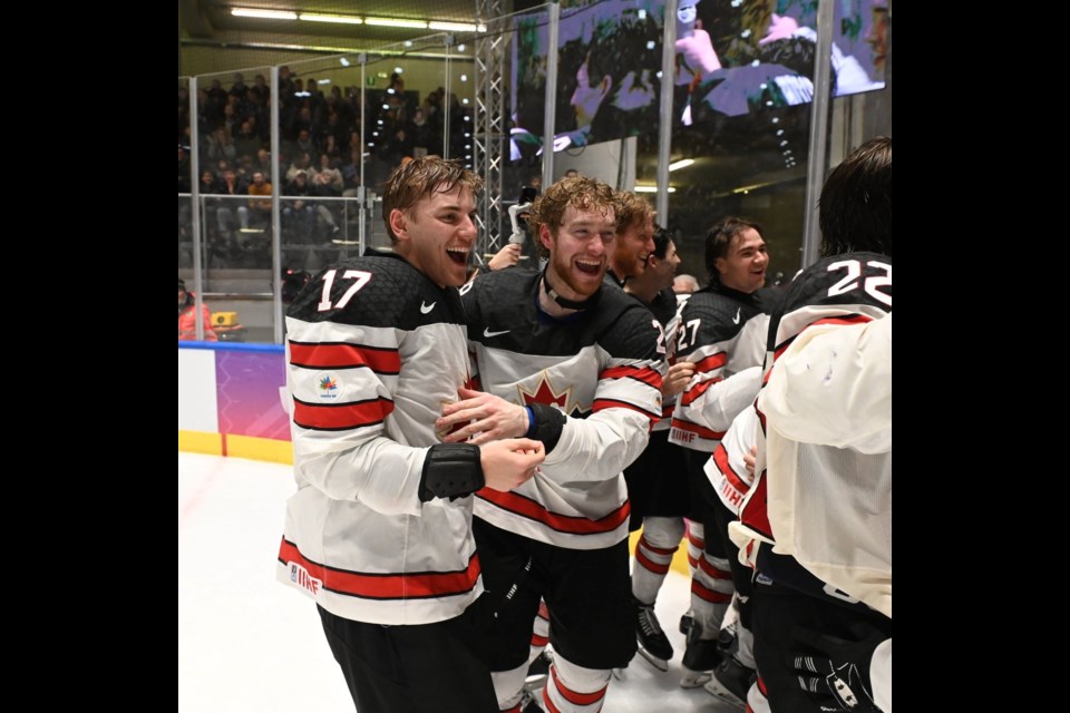 Former Prince George Cougars forward Connor Bowie, centre, celebrates Canada's 3-1 win over Slovakia in the gold-medal game Wednesday (Jan. 22, 2025) at the 2025 World University Games in Turin, Italy.