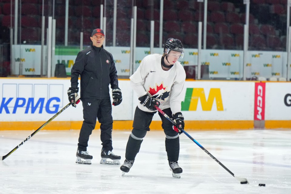 Dan De Palma gets a close-up look at his goaltenders during a training session with Canada's world junior team in Ottawa. The 53-year-old Prince George native will serve as Canda's goaltending consultant for the upcoming tournament, Dec. 26-Jan.5.

PHOTO: Andre Ringuette/Freestyle Photography
