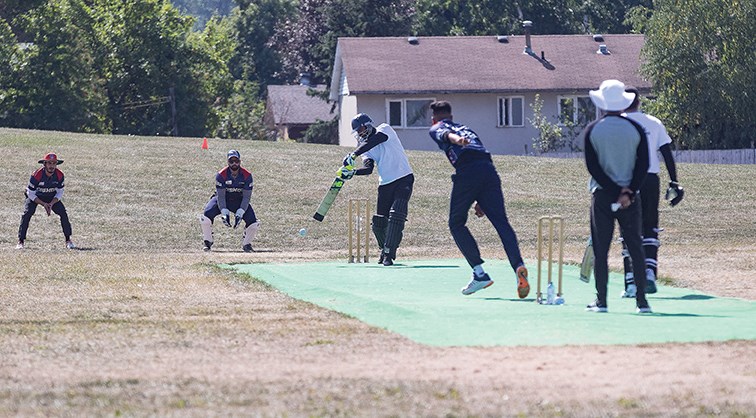 Citizen Photo by James Doyle/Local Journalism Initiative. The batter from Quesnel Cricket Club tries to hit the ball hurled by the Surrey's Cosmos Cricket Club bowler on Saturday at Vanier Park during the Prince George Cricket Club's 4th Annual Cricket Tournament. The tournament featured six teams, the Quesnel Cricket Club, Cosmos Cricket Club from Surrey, Fort St. John Direwolves Cricket Club, as well as, three local Prince George teams. 