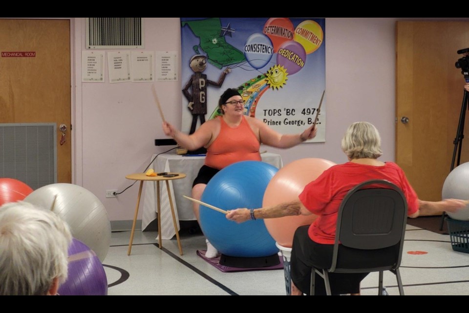 Shirley Morin, cardio drumming instructor at Spruce Capital Seniors Centre, leads the class to better health on Monday and Thursday morning each week. Shirley says the joy on her face is a reflection of what she sees in her students every time she teaches the cardio drumming class.